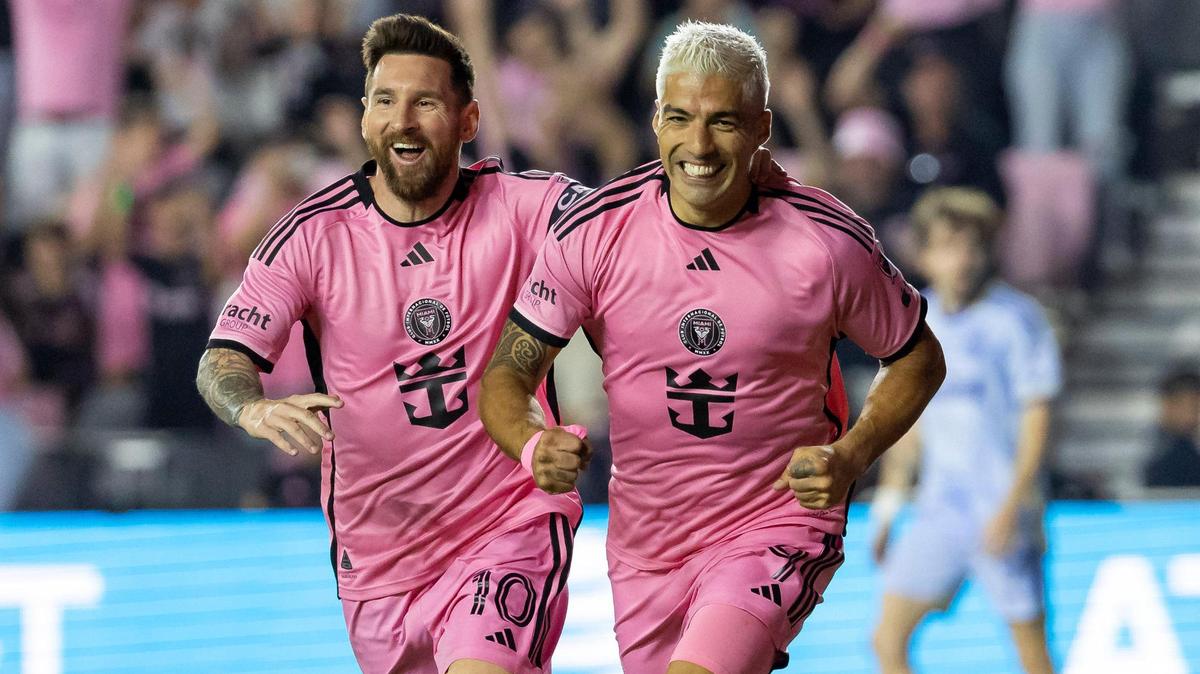 Inter Miami forward Luis Suárez (9) celebrates with forward Lionel Messi (10) after scoring a goal against Atlanta United in the first half of match one of their MLS Playoffs opening round series at Chase Stadium on Friday, Oct. 25, 2024, in Fort Lauderdale, Fla.
