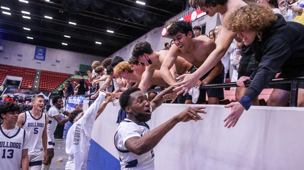 Riviera Prep’s Joahim Ametepe (24) and teammates celebrates the win with fans after defeating Holy Trinity Episcopal in Class 3A semifinal on Wednesday, March 2, 2022.