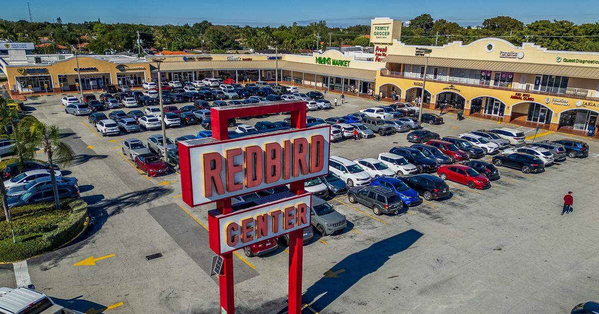 Aerial view of the Red Bird Shopping Center on Wednesday, Dec. 31, 2025. The property was recently sold to a developer for $62.1 million. The center is at the northwest corner of Southwest 40th Street (Bird Road) and 57th Avenue (Red Road), neighboring Coral Gables.