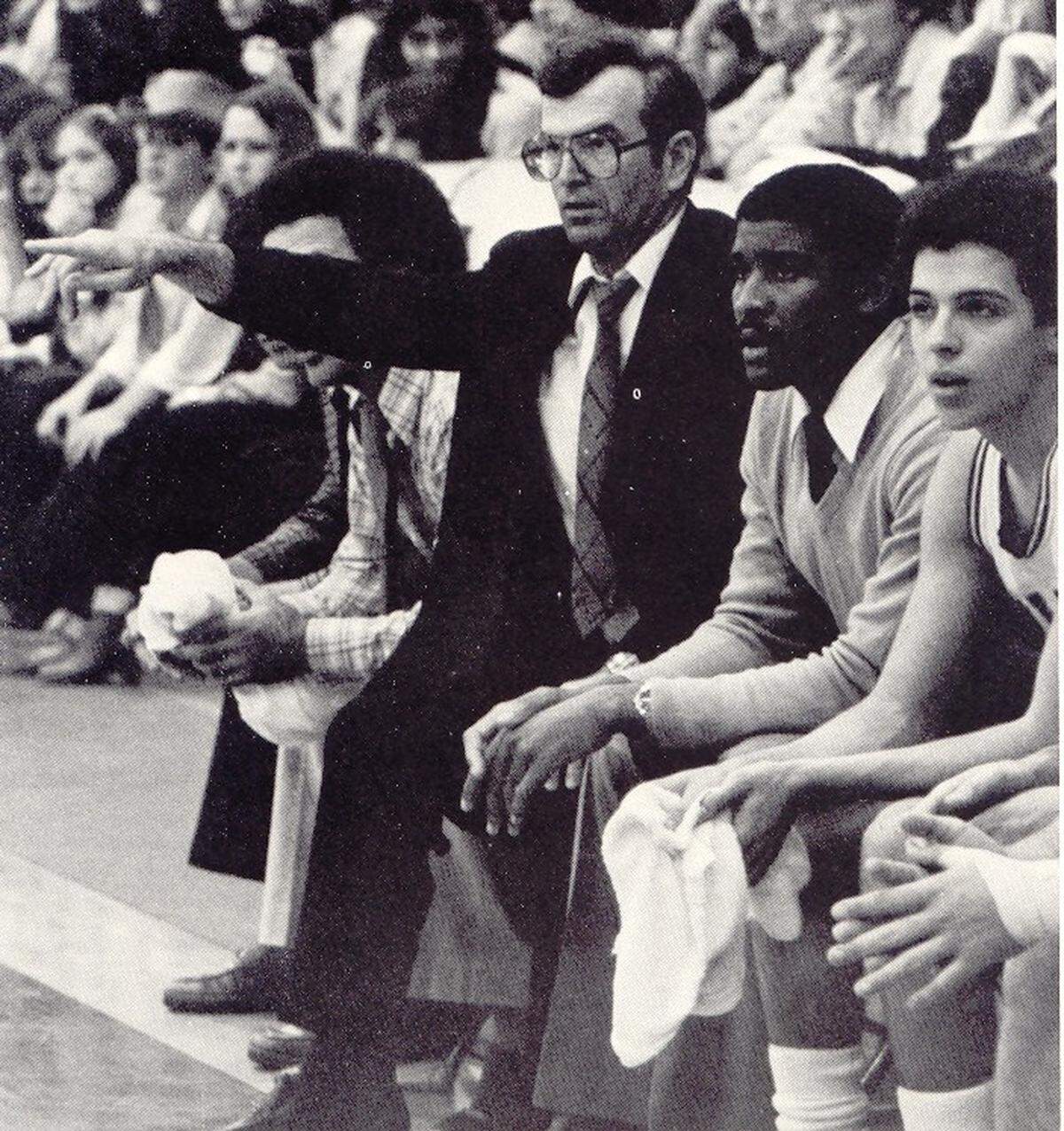 Brother Kevin Handibode holds court at a Christopher Columbus High School basketball game in this 1979 file photo. The veteran administrator, who has held many titles including principal and president and teacher since his arrival on campus in 1966, was the Catholic boys’ school’s basketball coach too.