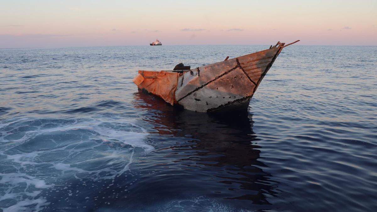 A migrant boat floats just off shore of Marathon in the Middle Florida Keys Sunday, April 23, 2023.