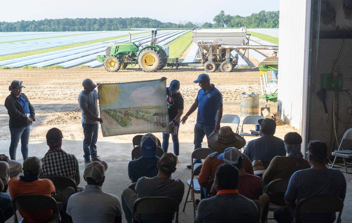 Farmworkers in a Fair Food Program education session.