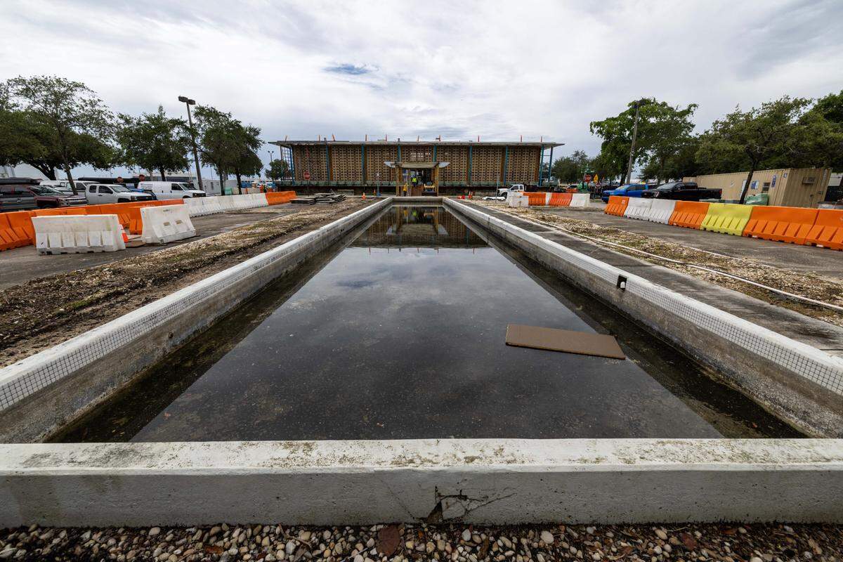 The reflection pool outside of Miami International Airport’s new private terminal on Wednesday, July 23, 2025, in Miami, Fla.