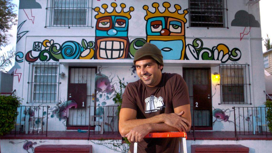 Artist David LeBatard (Lebo) at an apartment building he painted in 2006. The beloved Miami artist died on Aug. 1, 2023.