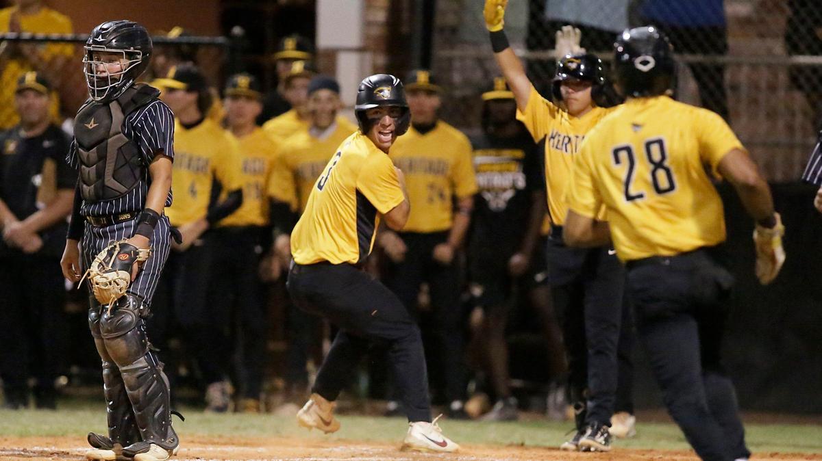 American Heritage players celebrate double run in a five run third inning during regional semifinal baseball game against Mater Academy Lions on Friday, May 10, 2024 at American Heritage HS in Plantation. Andrew Uloza / for Miami Herald