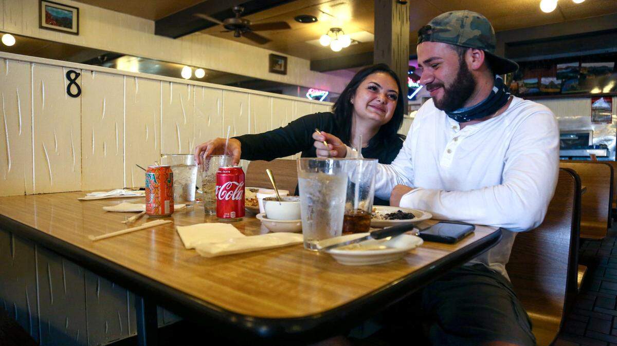 Nathalie Garcia, 19, and Joshua Wainright, 22, enjoy lunch at Rio Cristal Restaurant during the first day of reopening for indoor dining in Westchester on Aug. 31.
