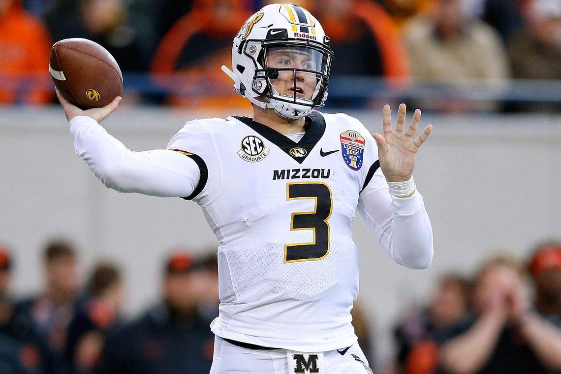 Drew Lock #3 of the Missouri Tigers throws the ball against the Oklahoma State Cowboys during the first half of the AutoZone Liberty Bowl at Liberty Bowl Memorial Stadium on December 31, 2018 in Memphis, Tennessee.