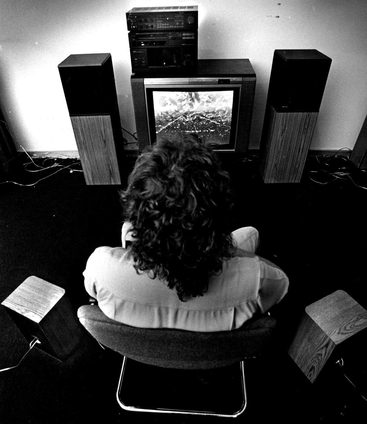 A store manager previews the surround sound experience at Sound Advice in Corla Gables.