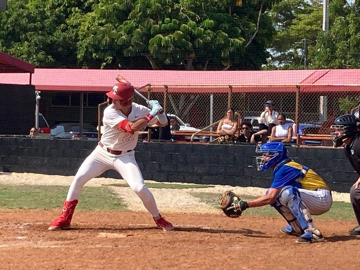 Miami Christian’s Alejandro Abreut stands in the batter’s box just before ripping an RBI double in the sixth inning, which helped the Victors beat Fort Pierce John Carroll 6-3 in the Region 4-2A baseball final at Miami Christian School.