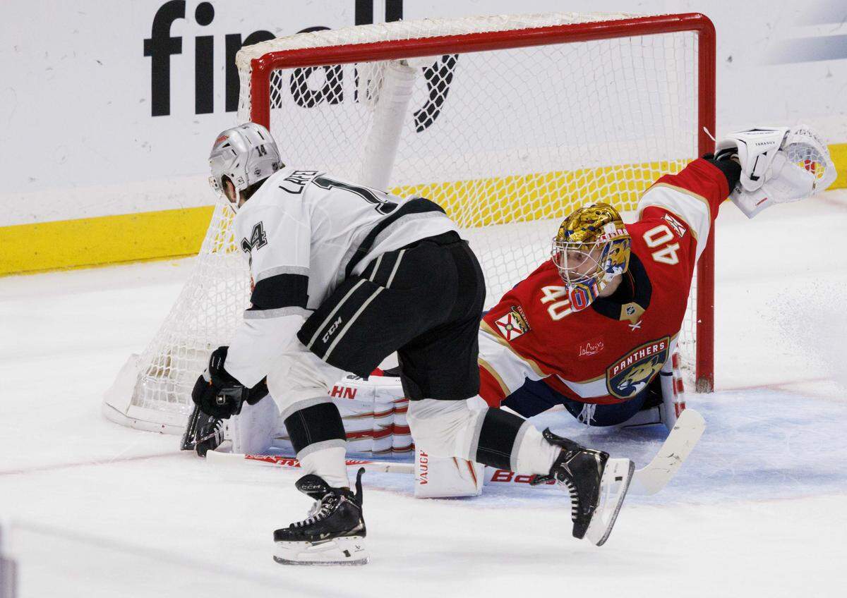 Florida Panthers goaltender Daniil Tarasov (40) blocks a shot by Los Angeles Kings right wing Alex Laferriere (14) during the second period of a game on Wednesday, Dec. 17, 2025, at Amerant Bank Arena in Sunrise, Fla.