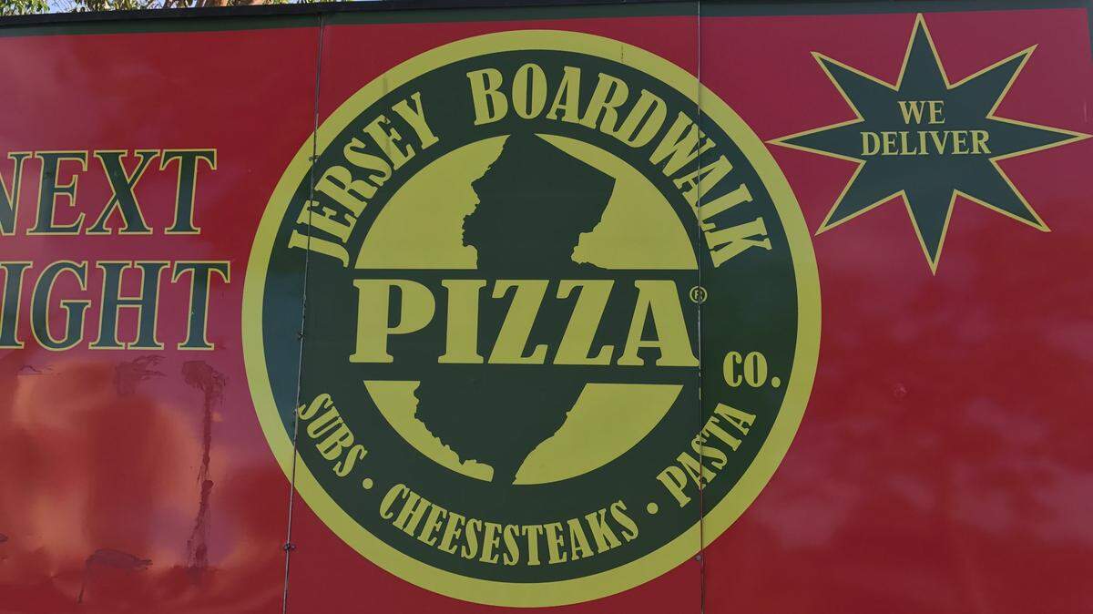 The sign for Jersey Boardwalk Pizza sits on the right-of-way in front of a location at 33497 South Dixie Highway in Florida City.