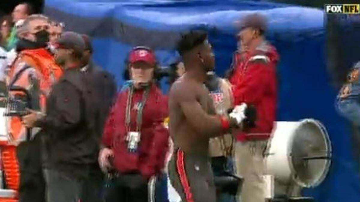 Antonio Brown of the Tampa Bay Buccaneers stripped off his pads and uniform jersey, throwing some gear to fans in the stands, before walking off the field mid-game on January 2 at the New York Jets.