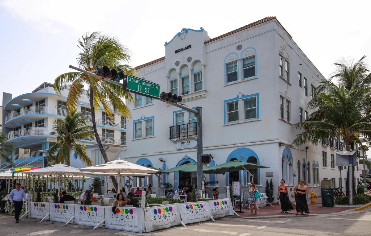Dinners eat at the sidewalk cafés on South Beach’s Ocean Drive on Tuesday afternoon, August 24, 2021. Taxes paid on hotel stays and restaurants go into coffers in Miami Beach.