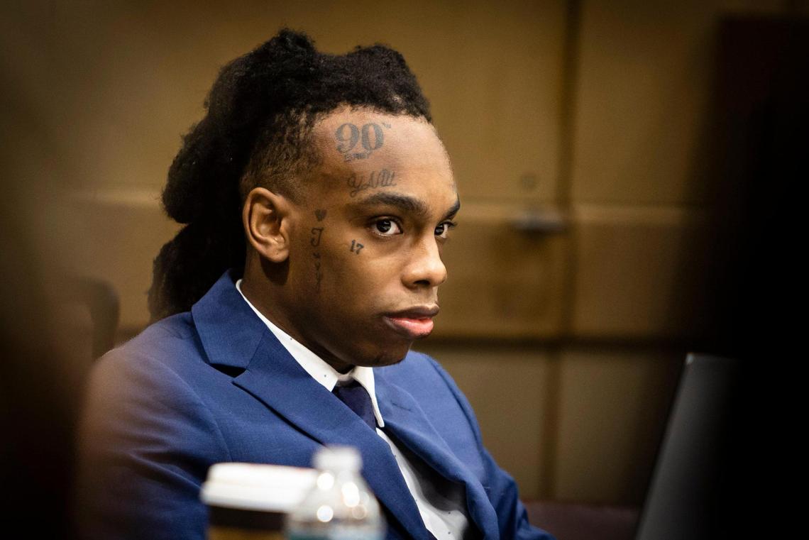 Fort Lauderdale, Florida - June 9, 2023 - Jamell Maurice Demons, known professionally as YNW Melly, listens intently during opening statements at murder trial in a Fort Lauderdale court.