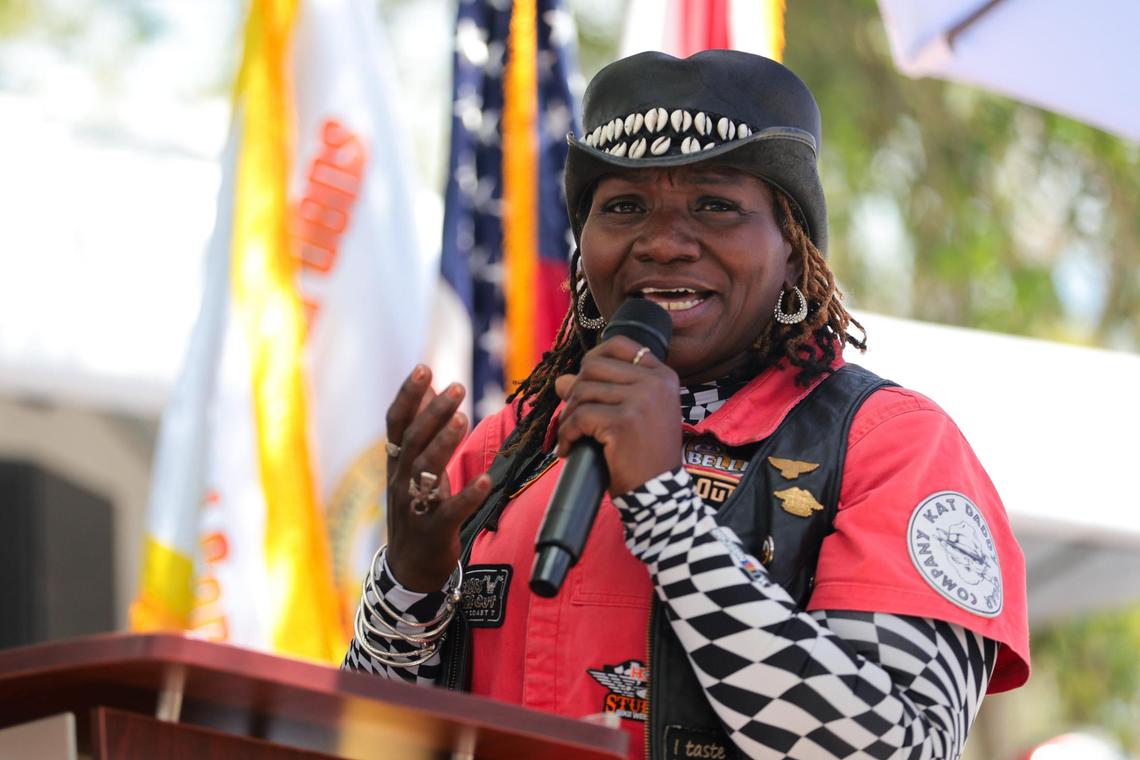 Shantell Williams, who holds a Guinness World Record for the fastest time by a solo rider to reach 48 states (just 27 days), speaks during the Bessie Stringfield street renaming ceremony in Miami Gardens.