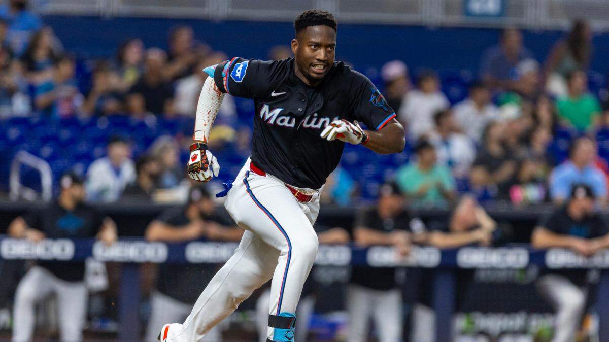 Miami Marlins base runner Jesus Sanchez (12) runs to first base during the second inning of an MLB game against the New York Mets at LoanDepot Park on Friday, July 19, 2024, in Miami, Fla.