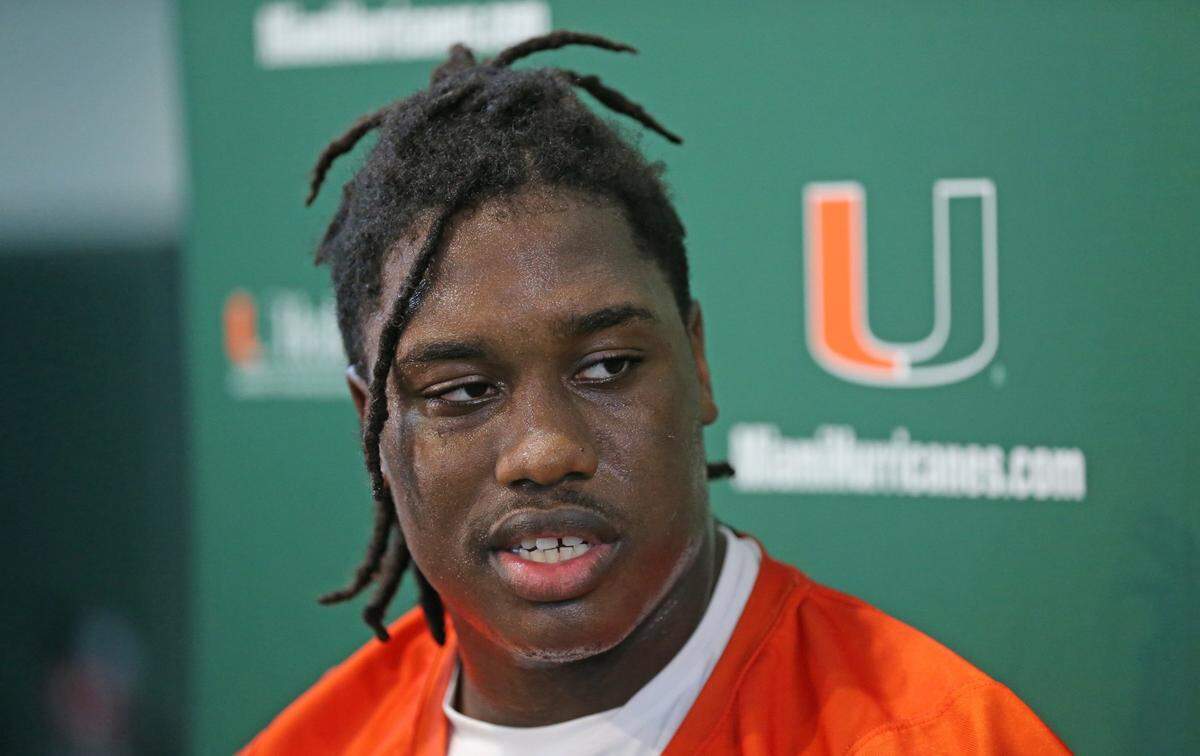 Miami Hurricanes offensive lineman Zion Nelson (60) speaks to reporters after practice at the University of Miamis Greentree Practice Field in Coral Gables on Wednesday, March 9, 2022.