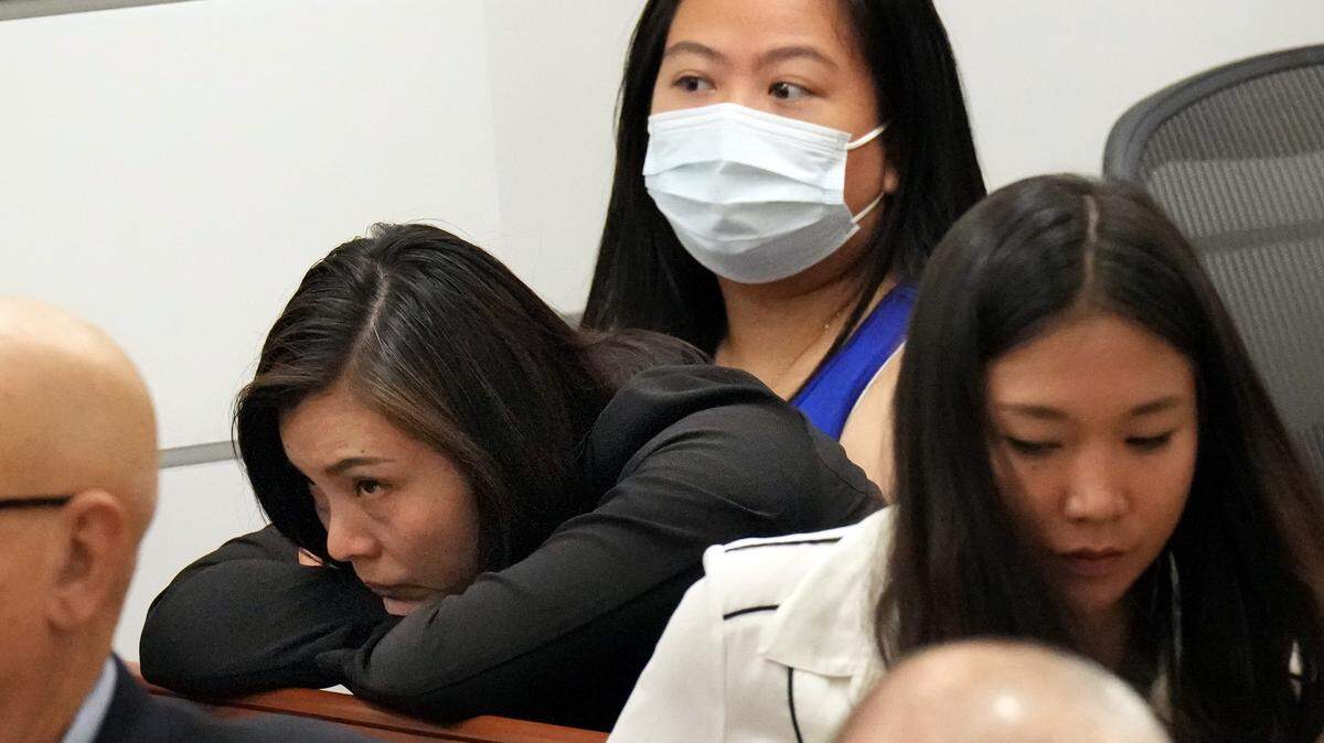 Hui Wang leans on a bench in the gallery during the penalty phase of the trial of Marjory Stoneman Douglas High School shooter Nikolas Cruz at the Broward County Courthouse in Fort Lauderdale on Tuesday. Wang’s son, Peter, was killed in the 2018 shootings. 