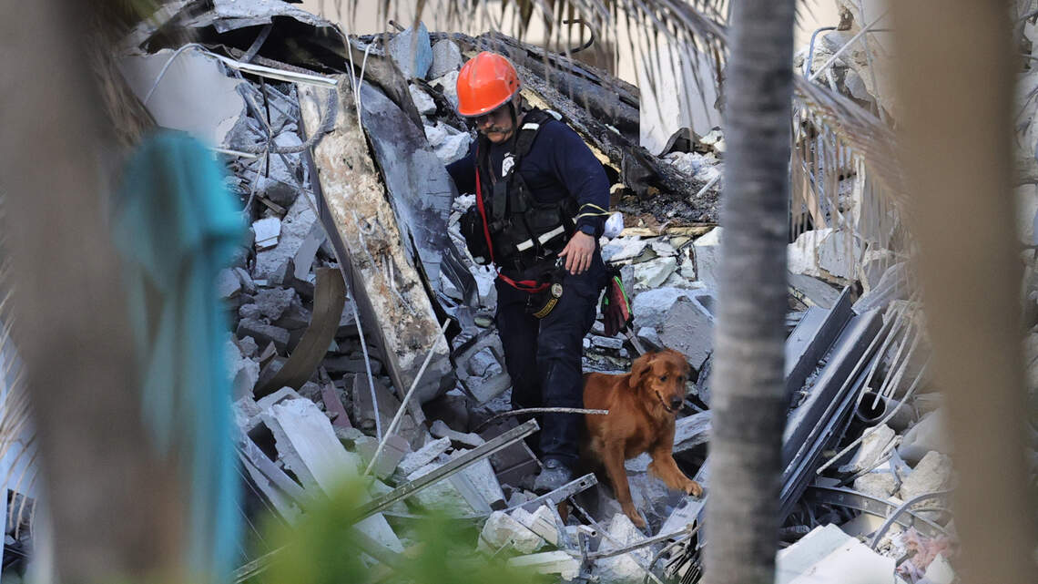 99 feared missing in rubble of collapsed condo in Surfside as search, vigil continue