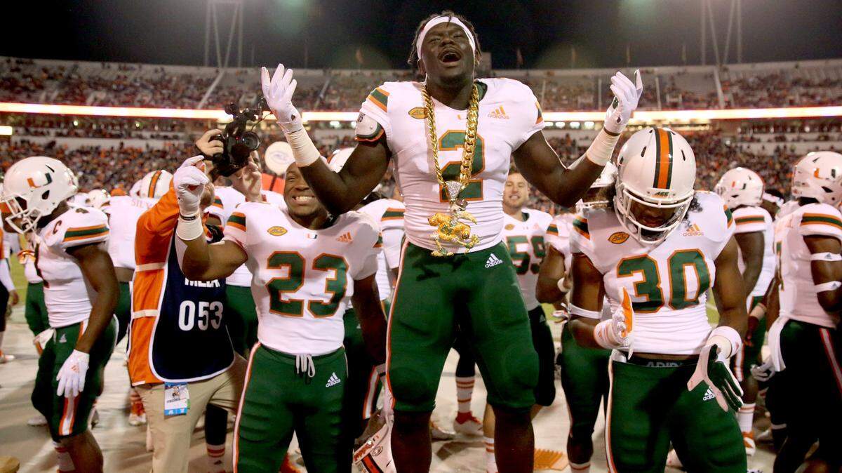 Miami Hurricanes defensive back Trajan Bandy (2) intercepts a pass Oct. 13 against Virginia. Bandy was UM’s most effective cornerback in pass coverage this season.