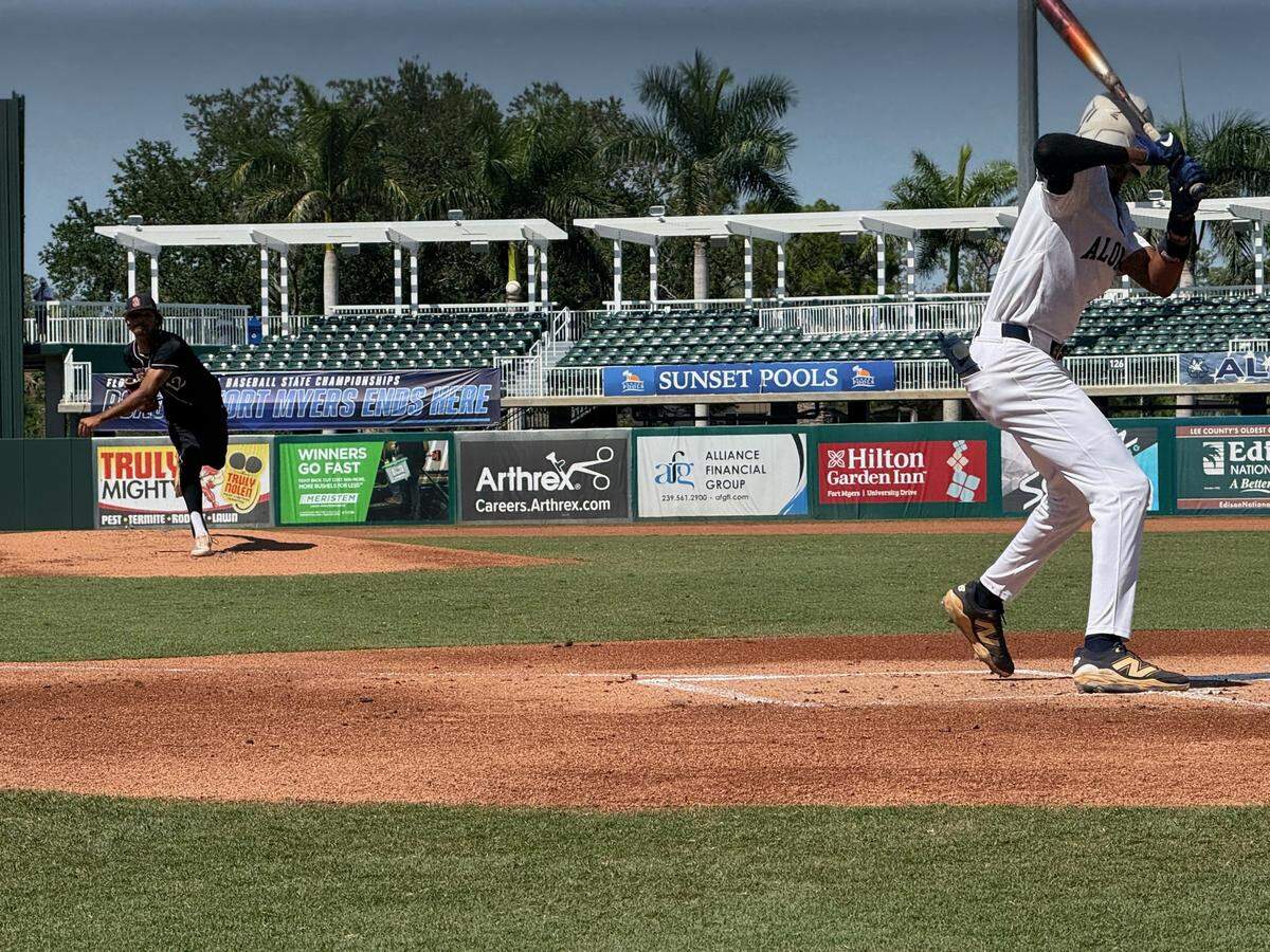 Douglas pitcher Gio Rojas (left) pitches against Tampa Alonso on Friday in the Class 7A state semifinals.
