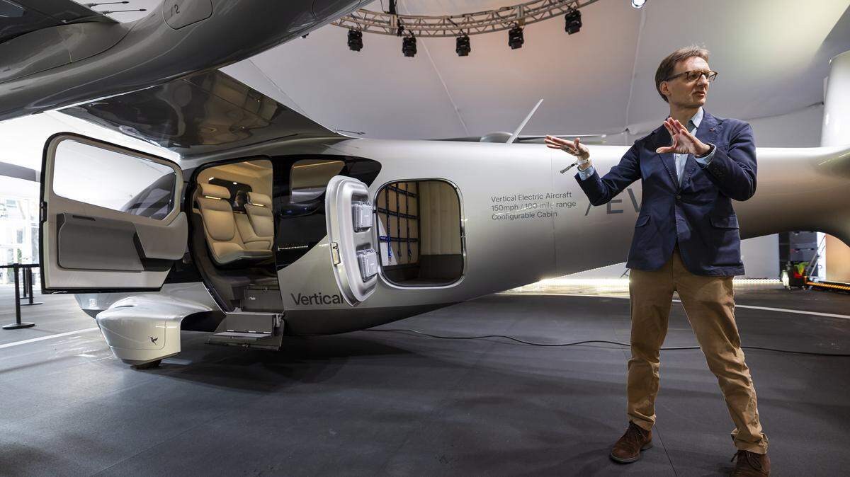 Michael Cervenka, chief commercial and strategy officer at Vertical Aerospace, gives a tour of his company's Valo, a next-generation electric aircraft, during a public display event at Collins Park on Tuesday, Feb. 24, 2026, in Miami Beach, Fla. The aircraft can fly up to 100 miles at speeds of up to 150 mph, features a panoramic window, has cabin space for up to six passengers and uses all-electric propulsion. The company says passengers will be able to travel from Miami to Fort Lauderdale in about 13 minutes.