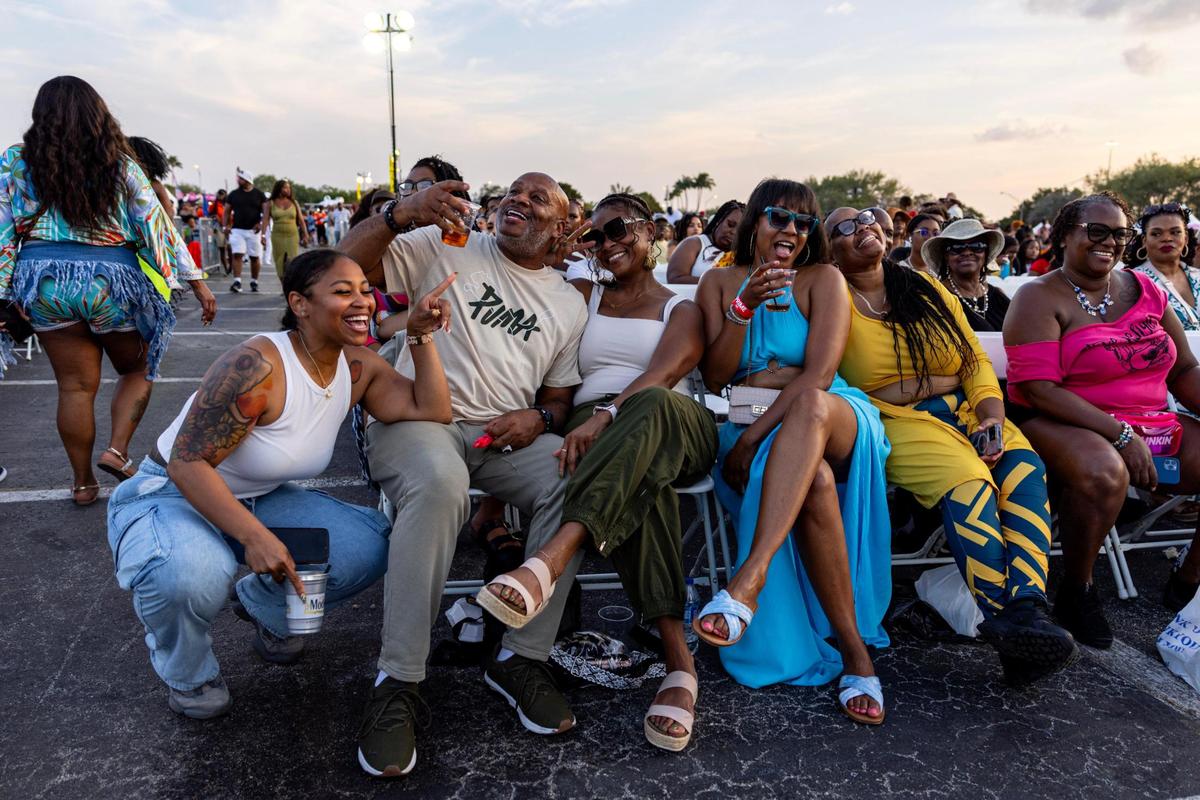 Festival goers react from their seats during Jazz in the Gardens at Hard Rock Stadium Arena in Miami Gardens, Florida, on Saturday, March 9, 2024.