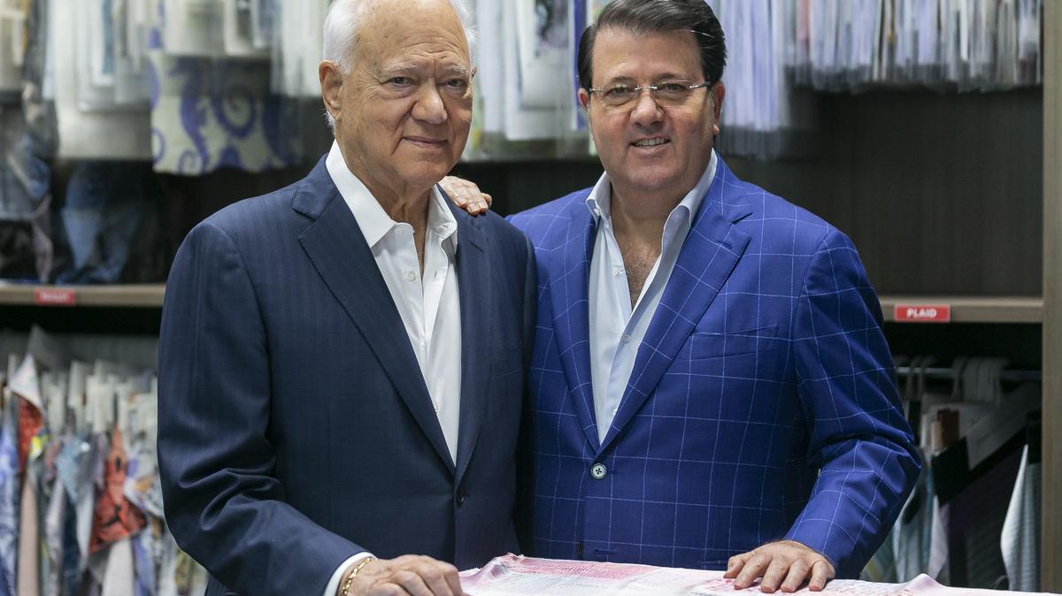 George Feldenkreis, left, and his son, Oscar Feldenkreis, the CEO and president of Perry Ellis, work from their headquarters in Doral on  Oct. 25, 2018. Perry Ellis was just taken over by the family after being public for 18 years.