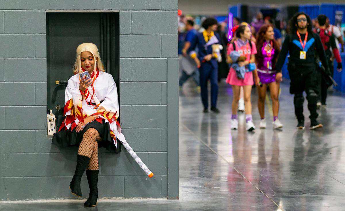 Janice Perez cosplays as Kyojuro Rengoku from the anime Demon Slayer: Kimetsu no Yaiba during Florida Supercon at the Miami Beach Convention Center on Saturday, July 9, 2022 in Miami Beach, Fla.