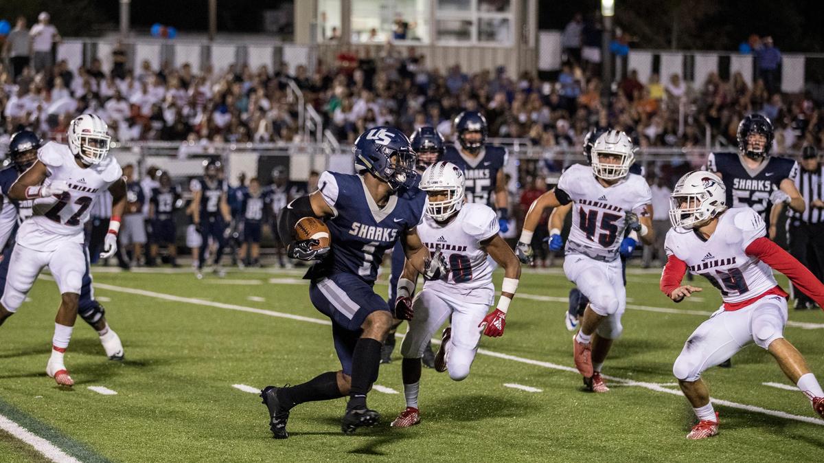 University Shark Kenneth McIntosh (1) is cornered by Chaminade defense in the second half of Friday’s game in University School on November 2, 2018. Chaminade is in the lead 17-0.