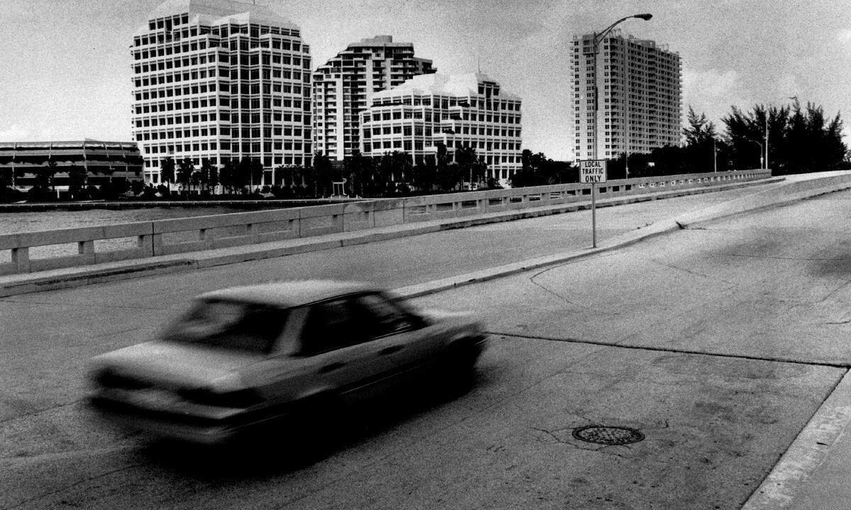 A car on the bridge on Southeast Eighth Street and Brickell Avenue in 1991.