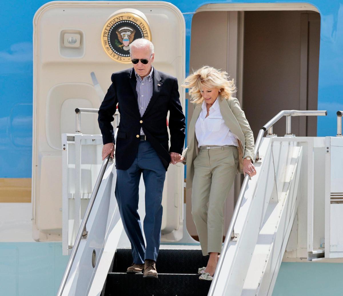 President Joe Biden and first lady Jill Biden touched down on the runway of Southwest Florida International Airport in Fort Myers. They were greeted by a line of local officials, Cape Coral firefighters and members of FEMA before boarding the Marine One helicopter as the president made his way to hard-hit areas of Fort Myers still recovering from Hurricane Ian on Wednesday, Oct. 5, 2022.
