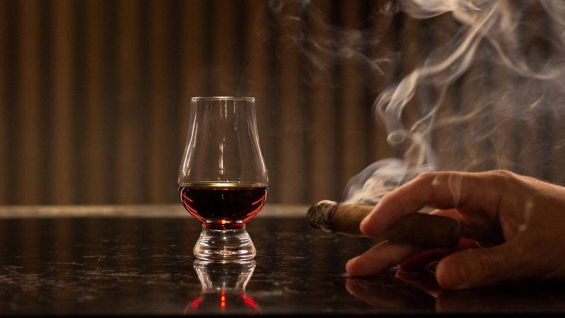 High-end port, cocktails and cigars are the specialties of Michael Beltran’s new El Vecino.