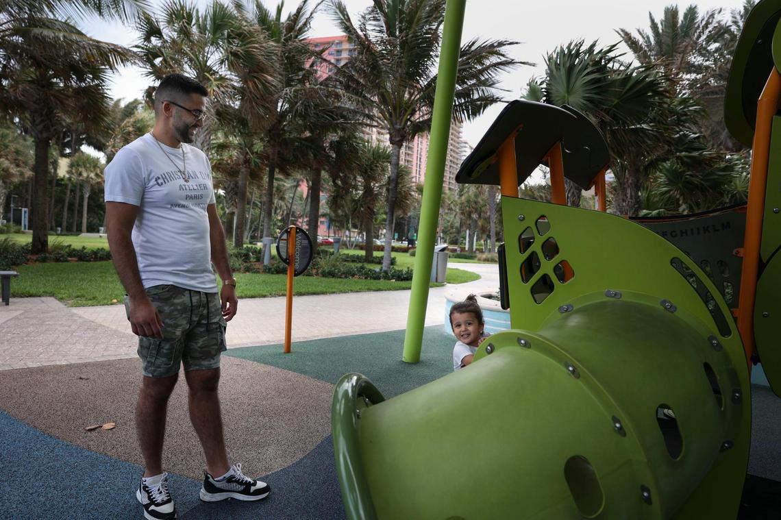 Oren Yakubov, from New York, plays with his son, Ari, in Samson Oceanfront Park in Sunny Isles Beach. Home rents there have increased 115% since the pandemic began in March 2020.