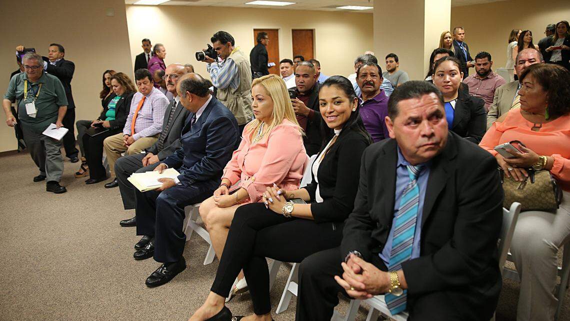 A group of Honduran community leaders from across the United States meet at the Honduran consulate offices in Doral last June to discuss TPS.