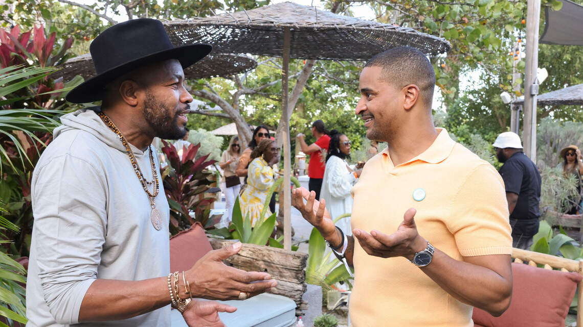 DJ D-Nice (left) and Chef JJ Johnson (right) chat at The Cookout in 2023. The Cookout and the Overtown EatUp! are part of the South Beach Food and Wine Festival’s commitment to highlight Black chefs. DJ D-Nice (left) and Chef JJ Johnson (right) chat at The Cookout in 2023. The Cookout and the Overtown EatUp! are part of the South Beach Food and Wine Festival’s commitment to highlight Black chefs.