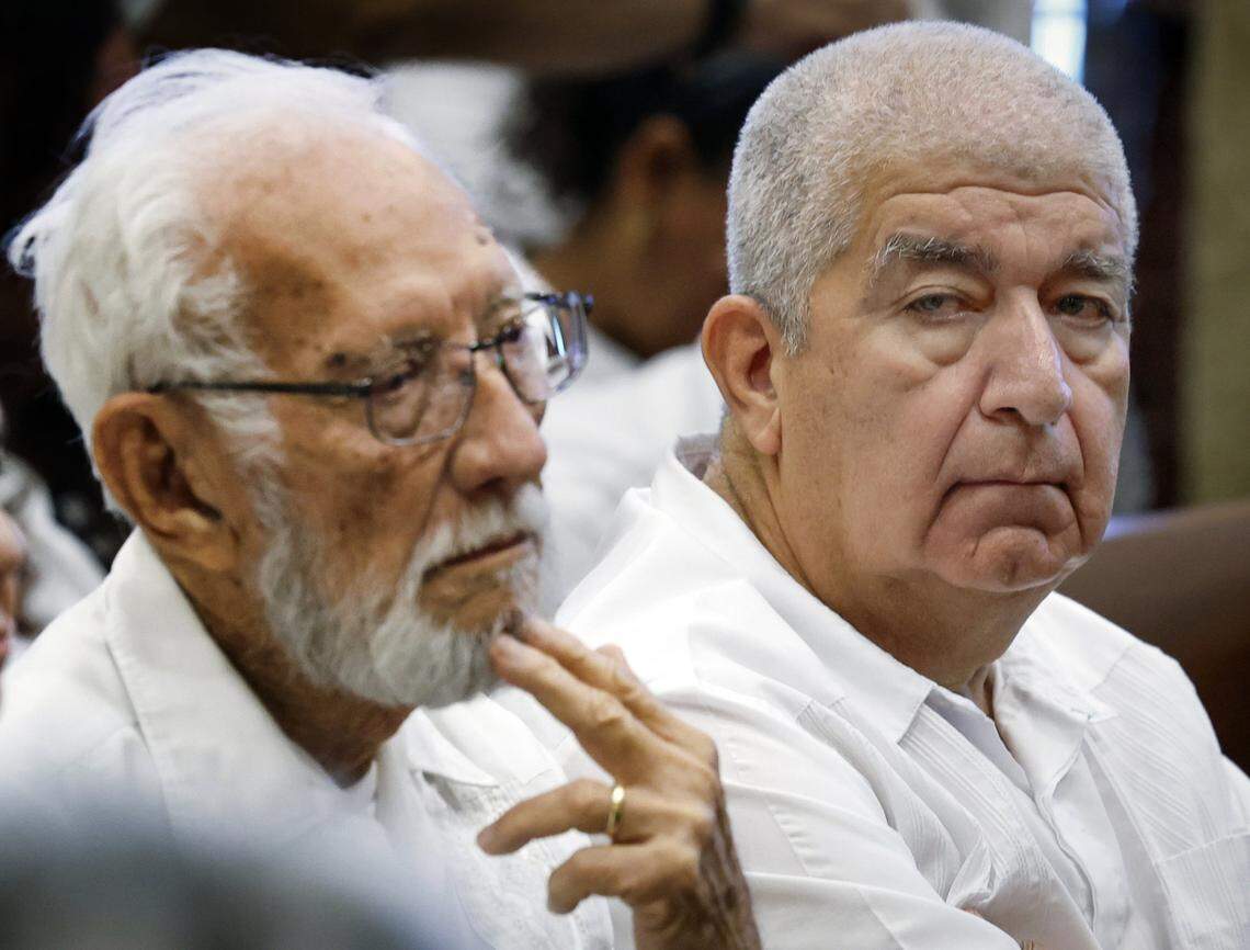 Enrique Zelaya, 67, seen at right, former medical chief for the Nicaraguan Contras, attends a mass trial of the remaining 100 plus residents of the L'il Abner Mobile Home Park, capping a nearly yearlong battle between residents and the park's ownership at Miami-Dade County Courthouse in Miami, Florida, on Thursday, August 14, 2025. 