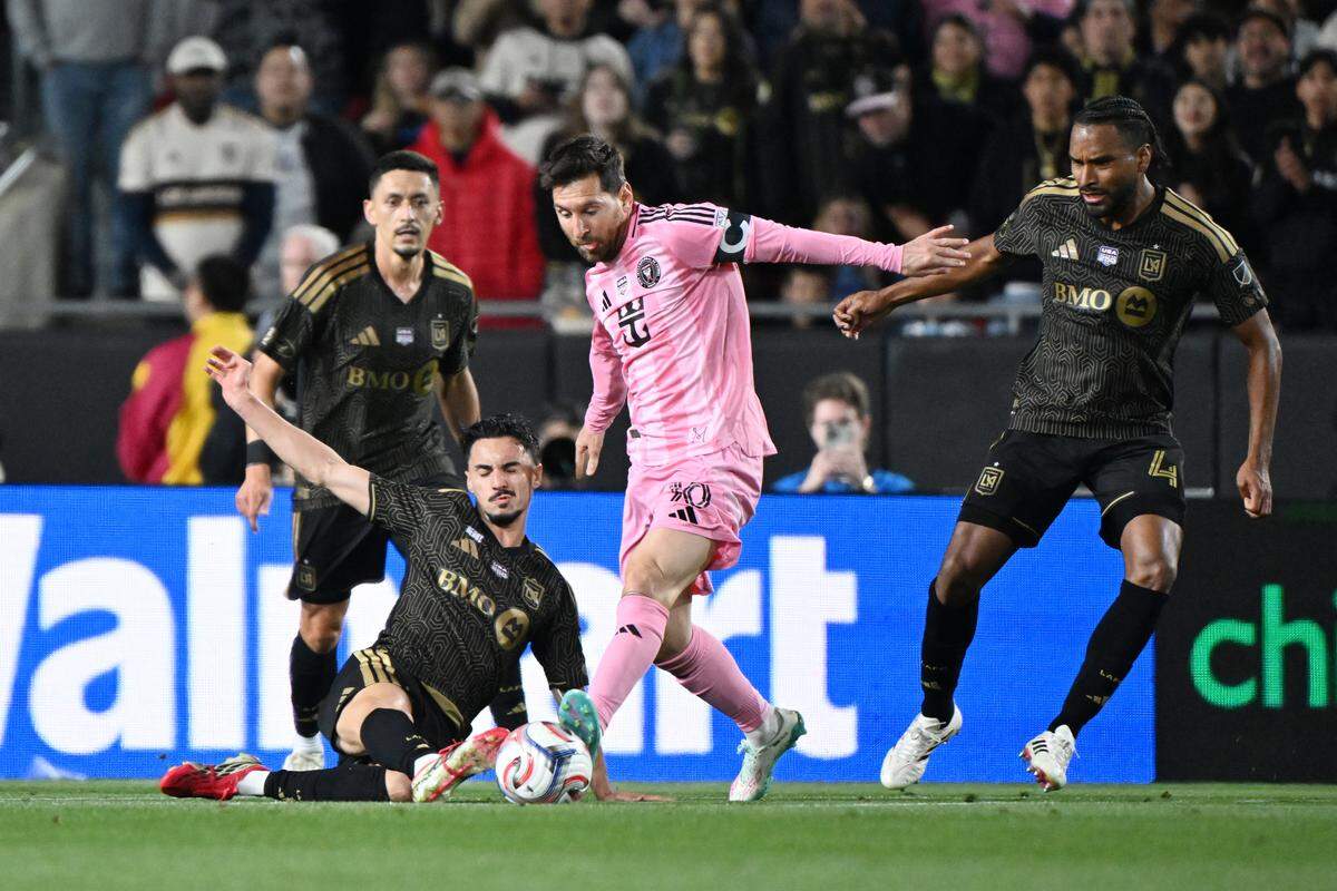 LOS ANGELES, CALIFORNIA - FEBRUARY 21: Lionel Messi #10 of Inter Miami CF and Stephen Eustaquio #46 of Los Angeles FC compete for the ball during the MLS match between Los Angeles Football Club and Inter Miami CF at Los Angeles Memorial Coliseum on February 21, 2026 in Los Angeles, California. (Photo by Shaun Clark/Getty Images)