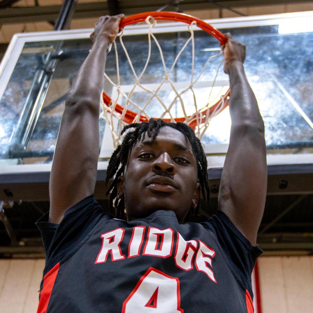 Spartans guard Koree Cotton strikes a pose for a portrait inside the gym at Miami Southridge High in Miami, Florida, on Friday, January 6, 2023.
