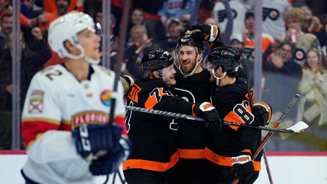 Philadelphia Flyers’ Joel Farabee, from right, Kevin Hayes and Owen Tippett celebrate past Florida Panthers’ Gustav Forsling after a goal by Farabee during the second period of an NHL hockey game, Thursday, Oct. 27, 2022, in Philadelphia. (AP Photo/Matt Slocum)