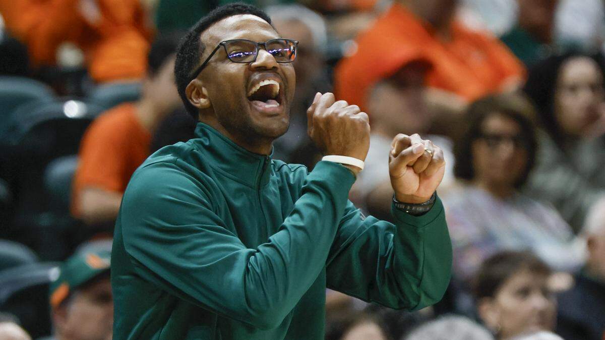 Miami Hurricanes head coach Jai Lucas signals towards the players during the second half lof the basketball game against the Boston College Eagles at the University of Miami’s Watsco Center in Coral Gables, Florida, on Saturday, February 28, 2026.
