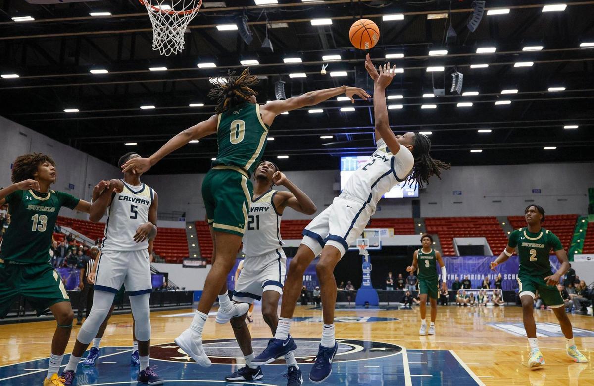Calvary Christian’s Kenneth Francis Jr. (2) scores the game winning basket in the final seconds of the game against Villages for the FHSAA Class 3A Boys High School Basketball State Championship at the RP Funding Center in Lakeland, Florida on Saturday, March 1, 2025.