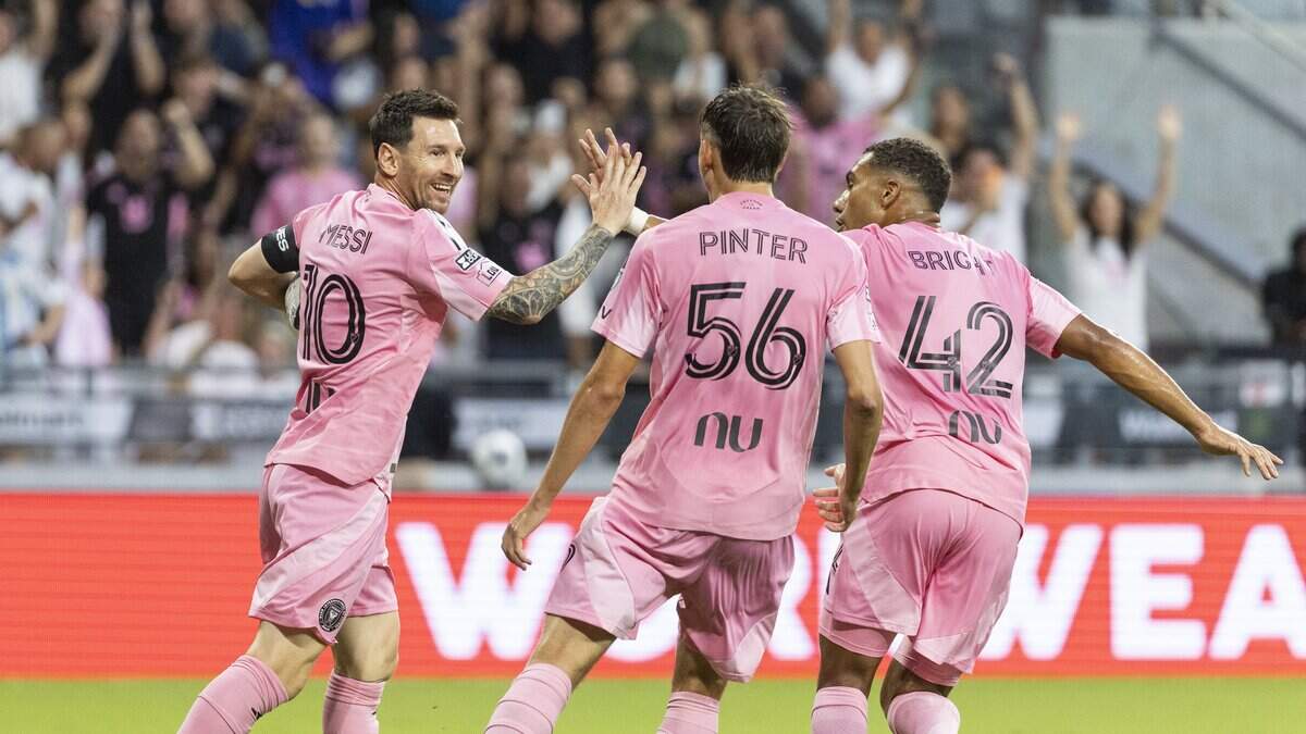 Inter Miami forward Lionel Messi (10) celebrates with midfielder Yannick Bright (42) and forward Dániel Pintér (56) after scoring a goal against Atlético San Luis in the first half of their Leagues Cup 2026 soccer match at Nu Stadium on Wednesday, Aug. 5, 2026, in Miami, Fla.