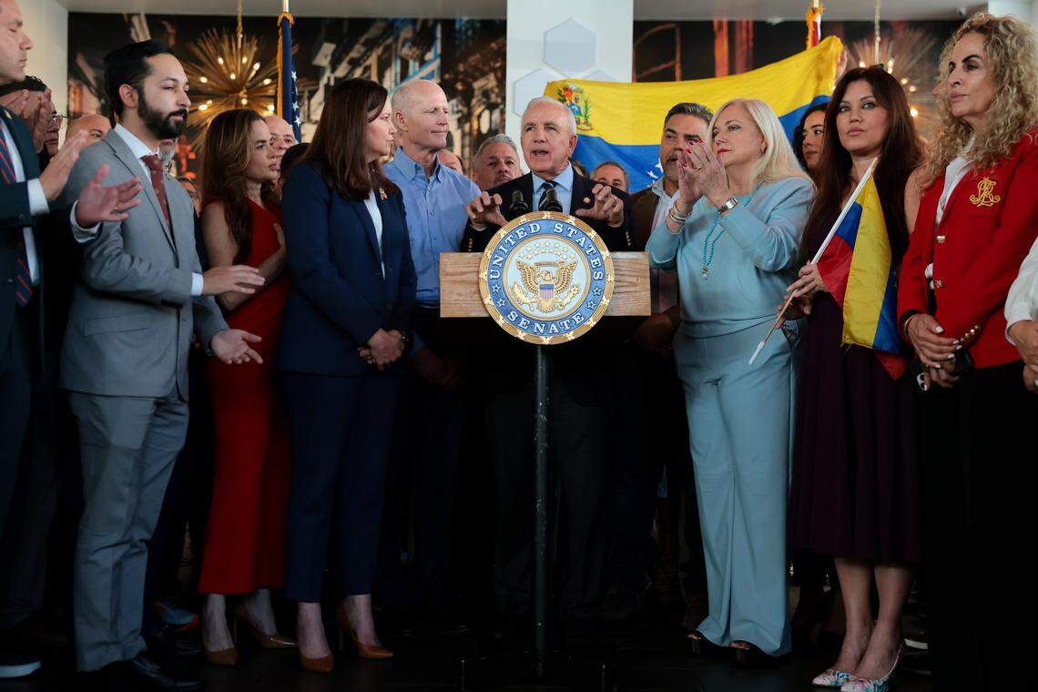 U.S. Rep. Carlos Gimenez joined by Sen. Ashley Moody and Sen. Rick Scott, speaks to reporters about U.S. actions in Venezuela during a press conference at Las Vegas Cuban Cuisine on Monday, Jan. 5, 2026, in Doral, Fla.