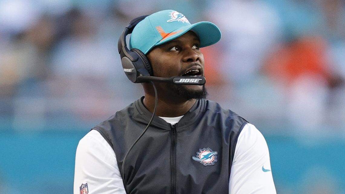 Then-Miami Dolphins head coach Brian Flores looks from the sidelines during the fourth quarter of an NFL football game against the Houston Texans at Hard Rock Stadium on Sunday, Nov. 7, 2021, in Miami Gardens, Florida.