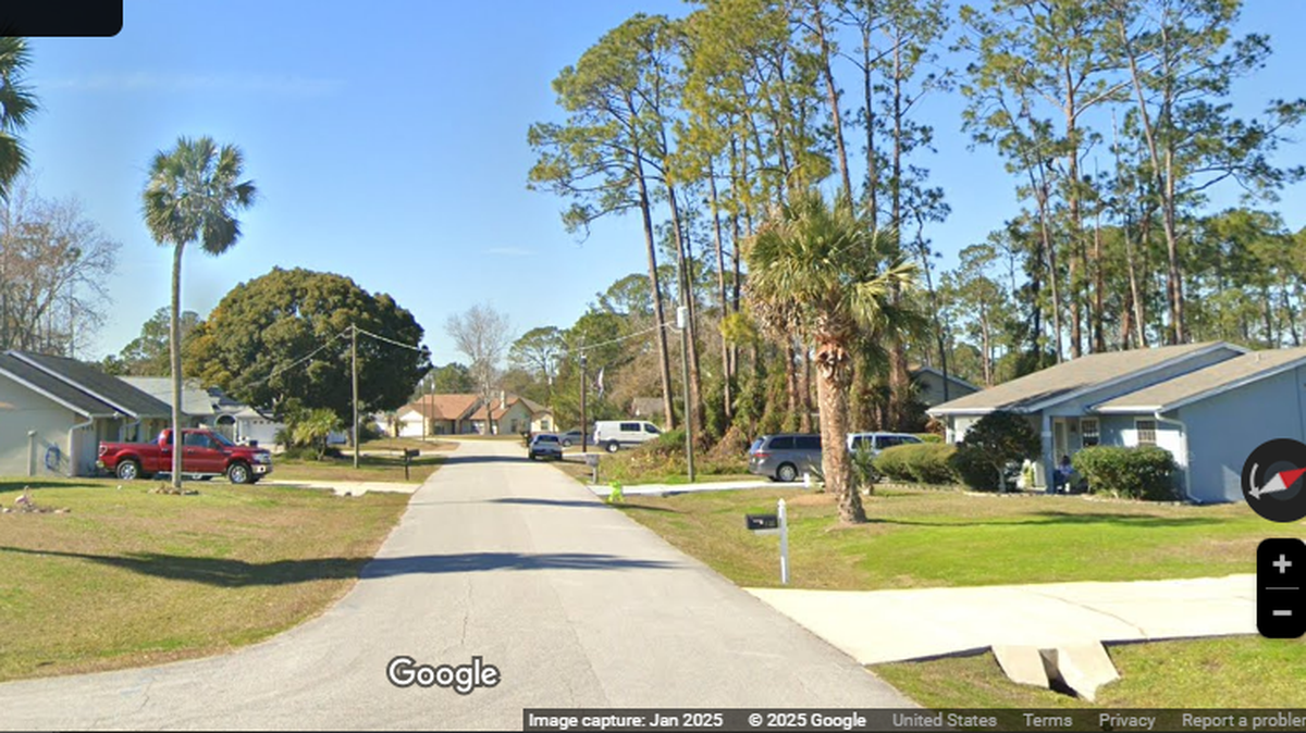 The suspect is accused of threatening neighbors in this community near Palm Coast, Florida, the Flagler County Sheriff’s Office says.