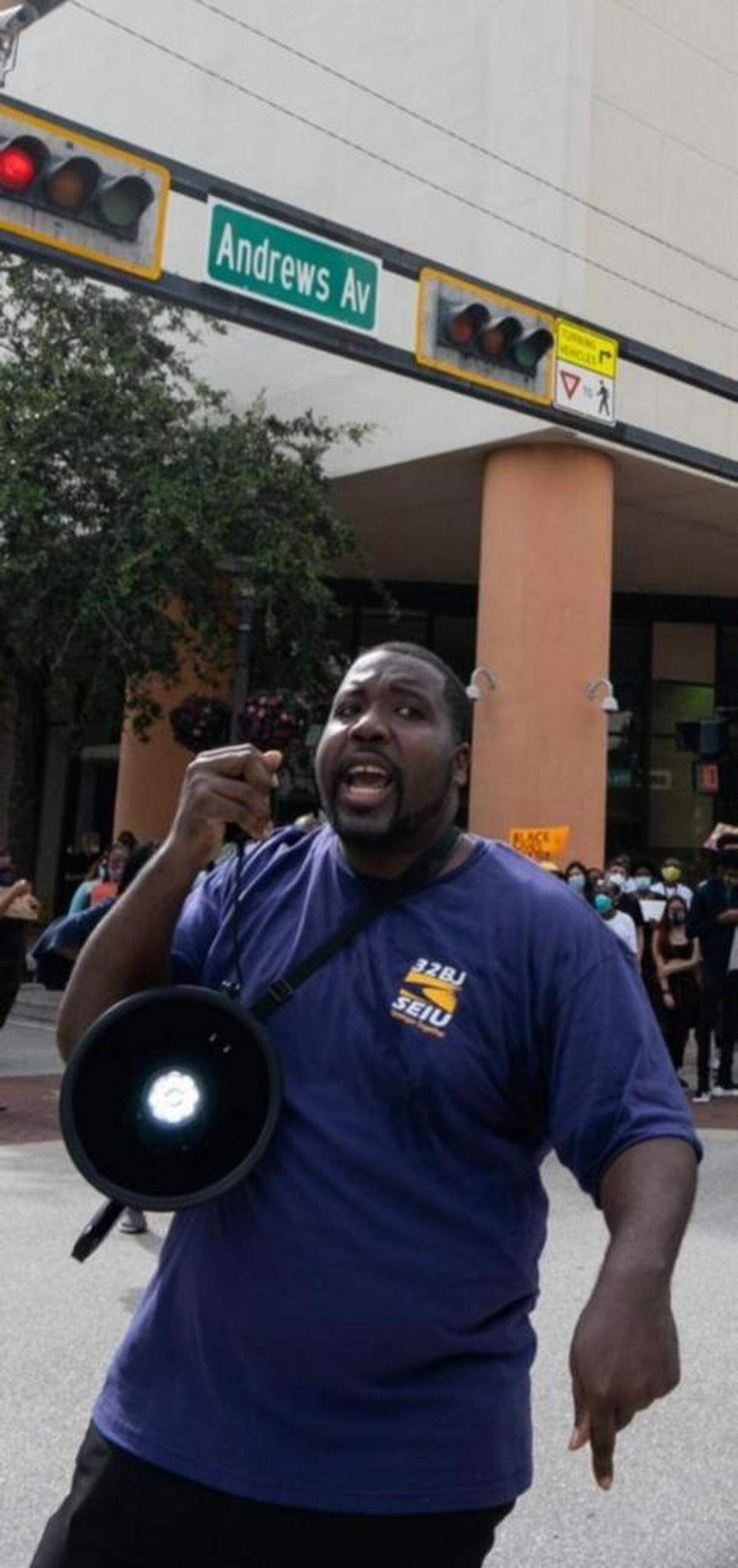 Rashad Grant at a rally to demand higher wages at Fort Lauderdale-Hollywood International Airport.