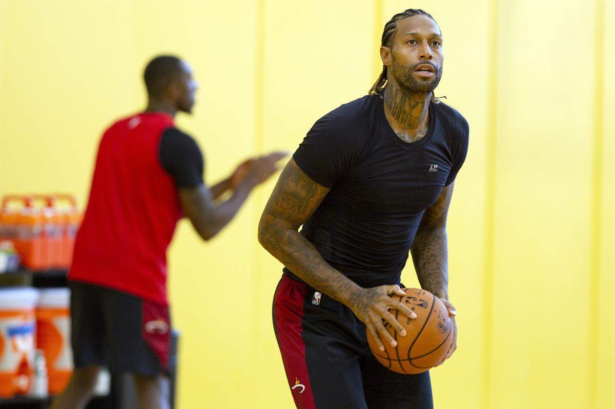 Heat power forward James Johnson (16) shoots around during practice at AmericanAirlines Arena on Oct. 13, 2019.
