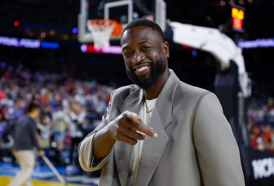 Miami Heat legend Dwyane Wade smiles during the first half of the Men’s Basketball Championship National Semifinal between the Florida Atlantic Owls against the San Diego State Aztecs at NRG Stadium in Houston, Texas on Saturday, April 1, 2023.