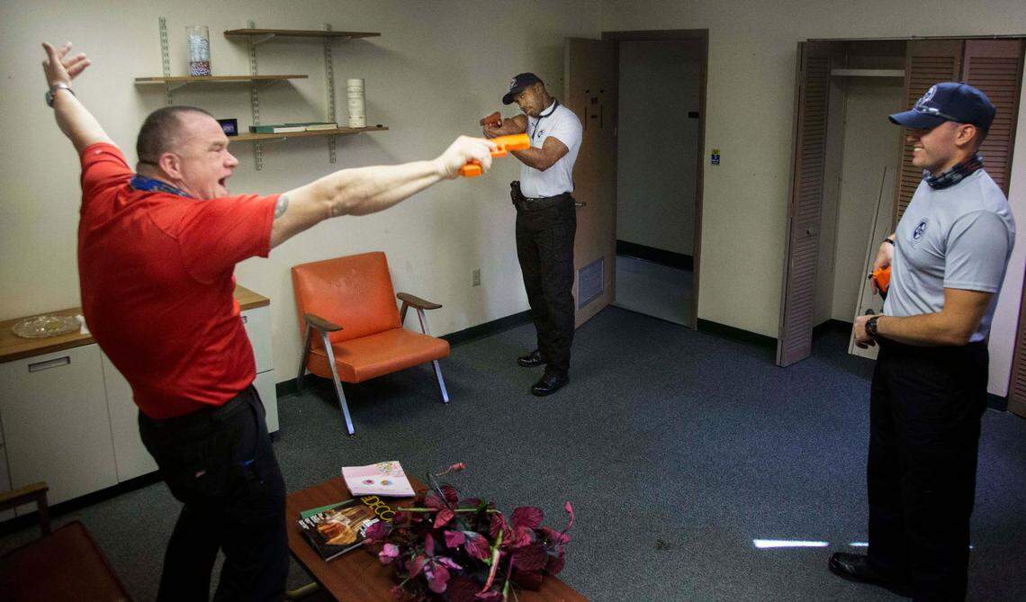 KeVonn Mabon, 27, decides when to pull the trigger during scenario training at the St. Petersburg police academy in December 2020.